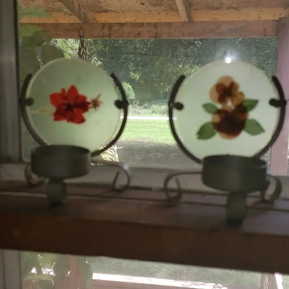 Vintage votive holders glass within is a flower